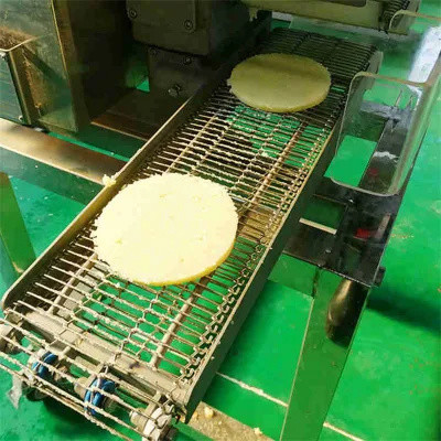 Macchine elevatrici per il carico automatico di carne nella lavorazione alimentare