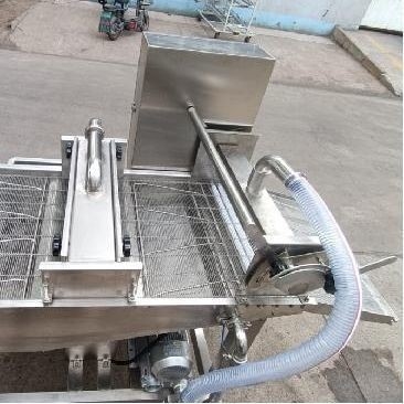 Macchine automatiche per battere e imballare il pesce per la lavorazione termica nell'industria alimentare