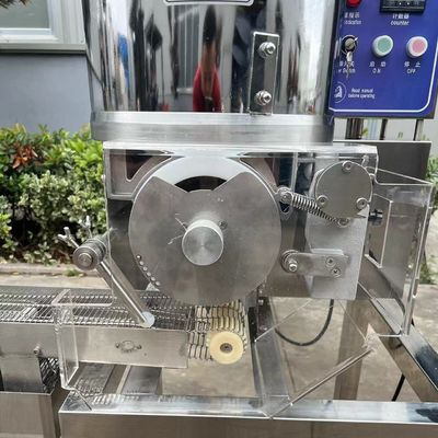380V di tensione termico di elaborazione hamburger e patate patty macchina per l'uscita